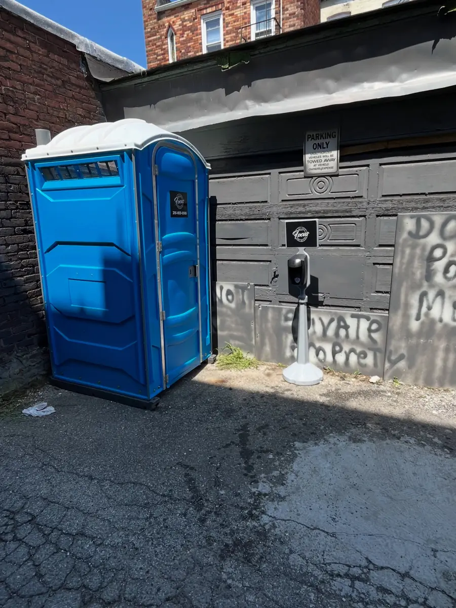 Porta potty setup similar to those delivered in Auburn